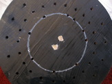 Picture showing the inside ring of holes, which are unequally spaced.